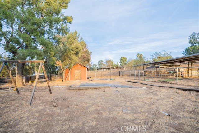 OLD BARN OR TACK ROOM AND CROSS TIES FOR THE WASH RACK. PLENTY OF ROOM HERE FOR MORE PLAYSETS OR MAYBE AN ADU FOR GRANDMA AND GRANDPA.