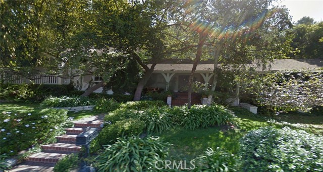 10560 Dolcedo Way Bel Air, California This 1936 charming home serenely sits upon this magnificent 25,921 SF lot in the coveted Lower Bel Air neighborhood. Nestled on a cul de sac with lush landscaping, this parklike setting is surrounded by walnut groves and birch, palm and eucalyptus trees. The filtered bright sun, shining through the trees, provides natural lighting for outdoor living and entertaining. There is even a Badminton Court to challenge your skills! Canyon wide views give the home a California Country ambience as it is surrounded by nature. Enjoy a lifestyle in a world of your own. The prestigious Bel Air Hotel is just a 10 minute walk away on Stone Canyon Drive, and close to shopping, restaurants and all that LA has to offer. Don't miss this opportunity to make your dreams come true! BUILDERS & DEVELOPERS: Here's your chance of a lifetime to team with a globally-respected designer of unique environments & vehicles to co-create / co-develop a prime showcase property in the celebrity-maxed excitement and quiet natural beauty of Stone Canyon Road. 6/10ths of a buildable available acre in lower Bel Air isn't just rare . . . . .it's unheard of at any price let alone accessible for world-renowned dining just a short walk from your own front door. Plan view drawing available upon request.