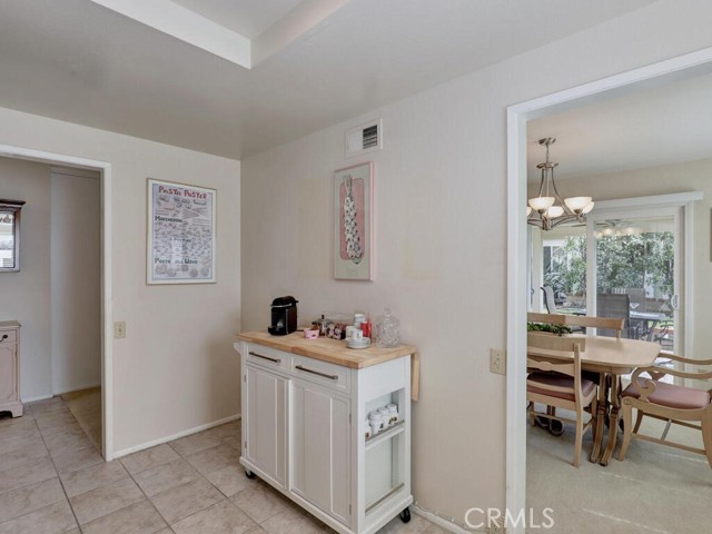 Kitchen nook area looking toward dining and hallway