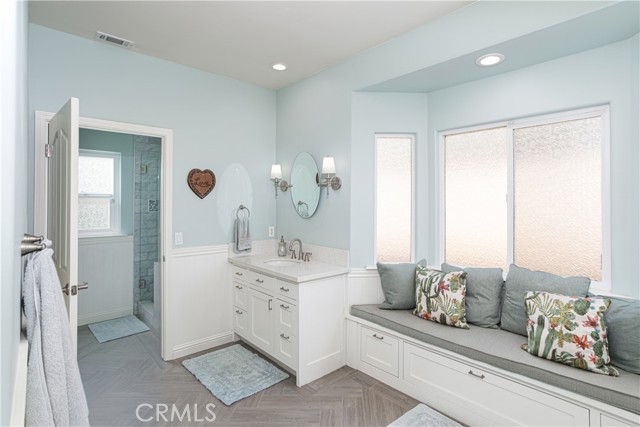 Large master bathroom area.