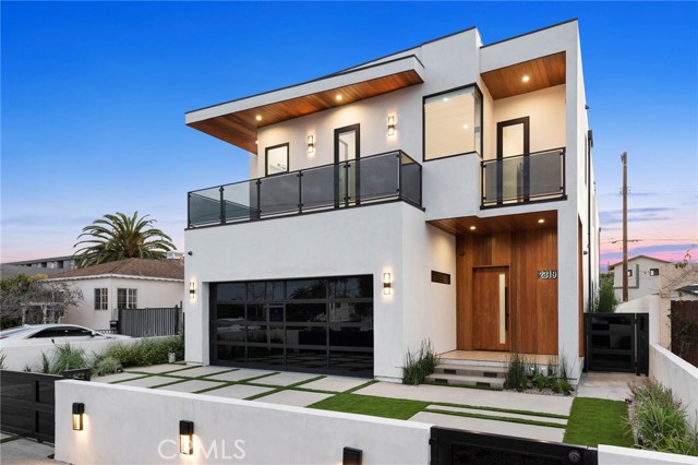 Stunning modern home in Venice on renowned Penmar Avenue, located moments away from the beach and marina, Abbot Kinney, and local shops and restaurants. Built in 2019, this newer construction home features an open floor plan, high ceilings and oversized windows that create a bright crisp ambiance. At the center of the home lies an outdoor courtyard with a soaking pool and glass walls that flood the main living spaces with natural light. Surrounding the courtyard are a spacious formal living room and family room, ideal for entertaining or enjoying quiet nights in. The designer kitchen features elegant cabinets fitted with Miele appliances and a cascading center island that overlooks the family room and the backyard patio. Rounding out the first floor are a half bath and intimate dining room with an elegant chandelier. Upstairs, the oversized master suite features a walk-in closet and spa-like bathroom with a free-standing soaking tub, dual vanity and glass shower. You will also find a lounge area, laundry room and three additional ensuite bedrooms. The rooftop terrace is the perfect spot to entertain, have a drink, or just relax and enjoy the breathtaking views. Additional features include a gorgeous floating staircase, numerous built-in features, 2 car garage and driveway parking.