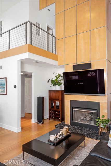 Upstairs landing overlooks living room for Juliet types