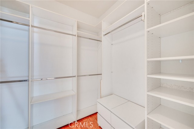 Organized walk-in closet.