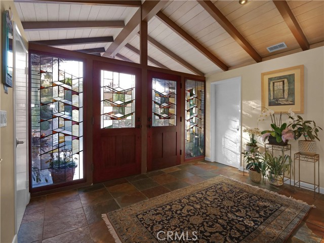 Foyer with beautiful stained glass doors