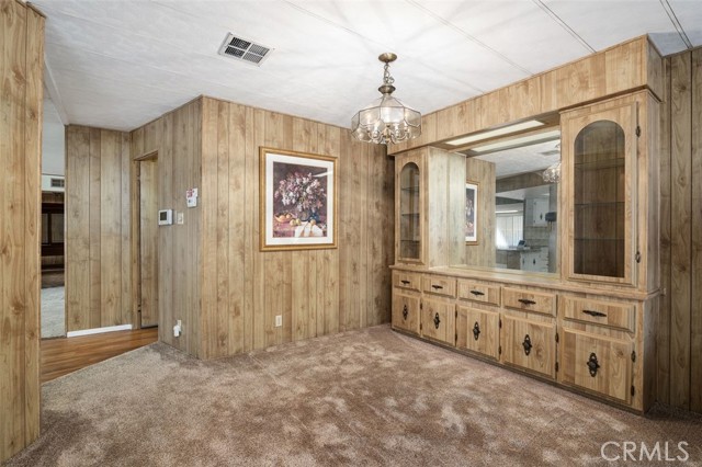 Formal Dining Area with built-in hutch and ceiling light.