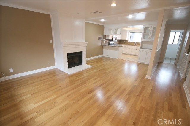 Living room w/fireplace and newer wood floors