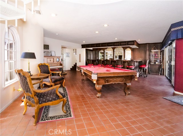 Family Room with pool table & wet bar (downstairs)