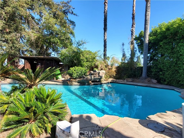 Pool view with rock waterfall