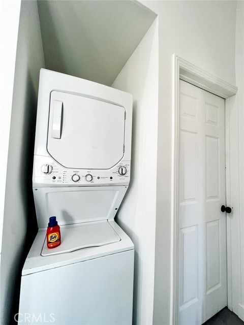In Unit Stackable Washer/Dryer with Overhead Linen Storage