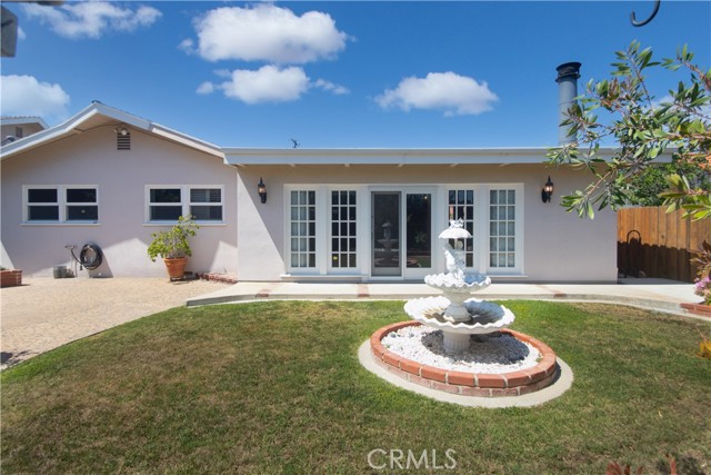 Backyard facing French doors.