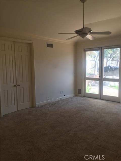 Master bedroom double door entry to bath on left and double door backyard access Master bedroom double door entry to bath on left and double door backyard access