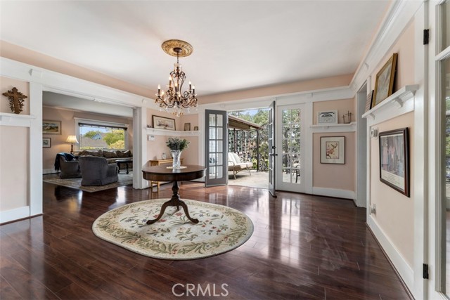 Foyer, display room or possible formal dining area