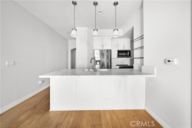 Large breakfast bar... this home has been renovated from top to bottom