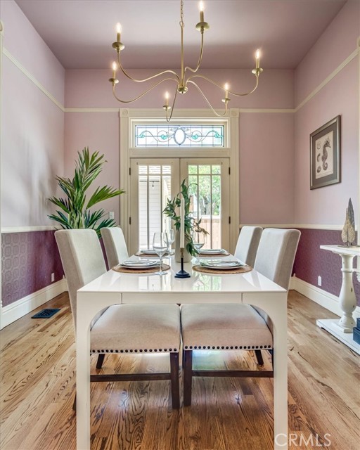 Dining area with french doors out to the outdoor patio area.