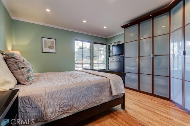 Primary bedroom at the front of the home, overlooking the front garden.