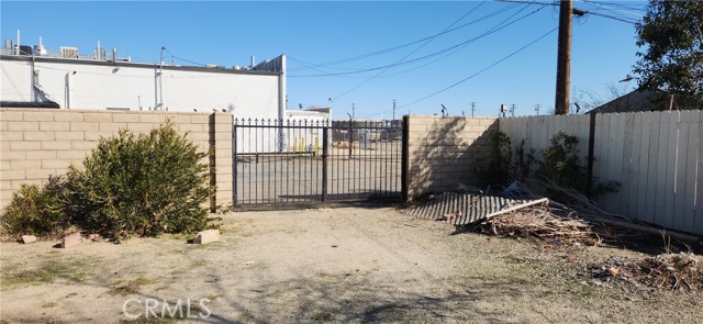 View to backyard and gate to alley.
