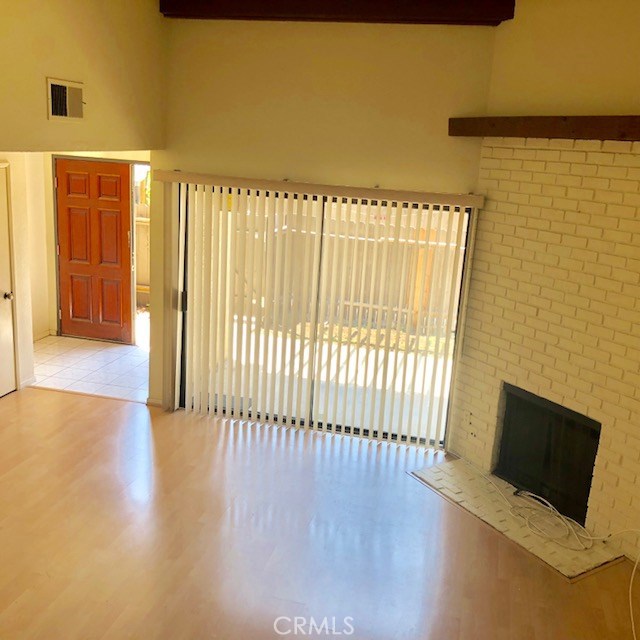 320 N Marguerita Avenue 9 Alhambra, California Great convenient location ,near the popular Main Street Restaurant Roll & shops.
Property is a large 1724 SQ FT Tri-level unit with 3 bedroom 2.75 baths ( including TWO SUITES ),Spacious family room with a wood burning fireplace,cathedral ceilings,wet bar, walk out to large front patio for a family entertaining occasion . Middle level has a Open Dining room overlook Living room and patio,polished kitchen with renovated newer customized wooden cabinets and granite counter top and a large bedroom with 3/4 bath next to dinning . Laminated wood floor ,through living room and dining room. The second story is fully carpeted with two master bedrooms,1st Master bedroom features bay window, walk-in closet, bathroom sky lite , and double sinks. At an estimated 1,724 square feet, this cozy enough to make its residents feel right at home. Brand New Laminate wood Floor. ????? NEW DISHWASHER, NEW WASHER, NEW DRYER AND in process to install BRAND NEW CARPET ON BOTH MASTER BEDROOM AND HALLWAY PRIOR on second floor ????.