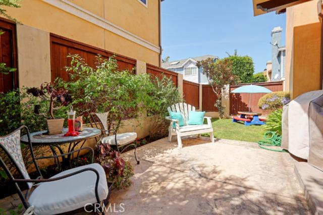 Beautiful patio and back yard for enjoying the south facing sun. Beautiful patio and back yard for enjoying the south facing sun.