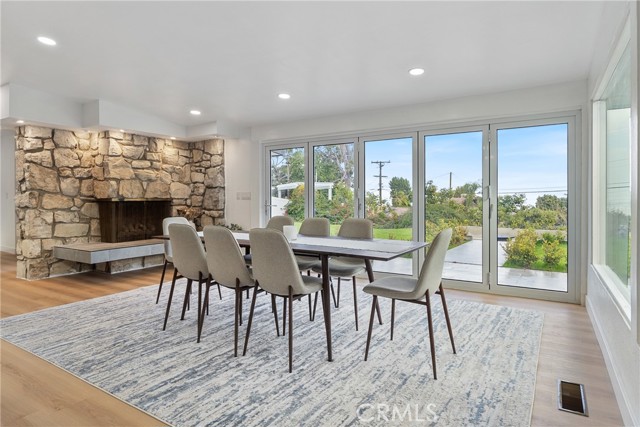 Bifold doors, view of front yard and firepit