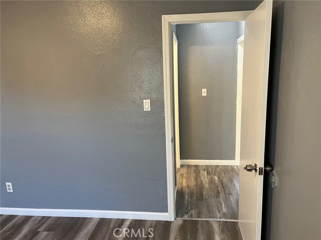 View into hall bath from living room