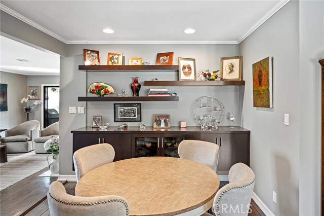 More dining area or game table room and the custom built-in cabinets allow for multiple seating arrangements for family, holidays or gatherings with friends.