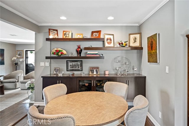 More dining area or game table room and the custom built-in cabinets allow for multiple seating arrangements for family, holidays or gatherings with friends.