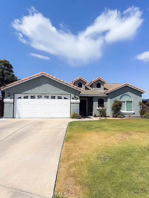 11406 Pacific Harbor Avenue