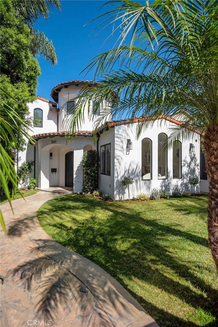 561 33rd Street Manhattan Beach, California MONTECITO MAGIC: Charming tree lined block in Tree Section you'll find a beautifully renovated 5 bedroom 6 bathroom family home. The interior and exterior of this home have had a complete, crisp refresh including natural oak floors, fresh paint, and brand-new lighting throughout. The formal living room features vaulted ceilings and triple tall arched windows that allow natural light to pour in and provides a beautiful view of the front yard with a happy olive tree. Just past the formal dining room is the open concept kitchen and family room. New features of this kitchen have been skillfully selected to match the Modern Montecito feel – new quartz countertops, baked tile backsplash, dark oiled bronze Emtek hardware, and gorgeous Hinkley pendant light fixtures over the island. Don’t miss the massive step-down pantry with plenty of space for all your cooking essentials. The heart of the home flows around an expansive center courtyard with 2 sets of French doors that allow that indoor/outdoor living. Upstairs you’ll find 4 bedrooms with ensuite bathrooms including a massive 500' Master Suite with a beautiful accent wall and private patio. The fifth bedroom with ensuite bathroom can be found downstairs set away from main liviing area, perfect for an office or guest suite. This stunner sits on a 5400' street to alley lot and includes a 3-car garage. Steps to the pocket park, walk to beach, chip path, downtown, uptown and a quick 12 minute drive to LAX – this home really has it all.