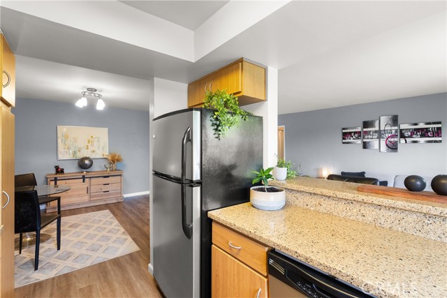 Kitchen opens to dining area and living room.