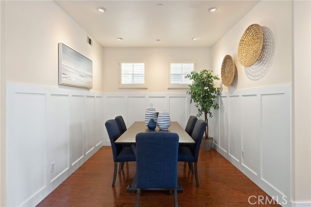 Formal dining room with more spot lighting