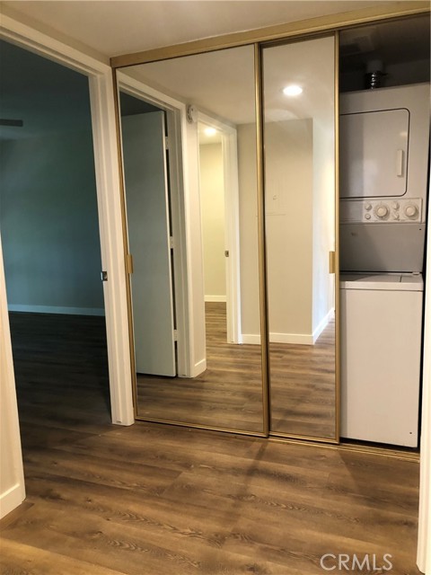 Inside Mirriored closet is your convient Stacable Washer and Dryer!