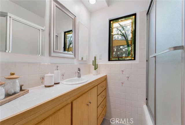 Secondary bath with lots of storage.