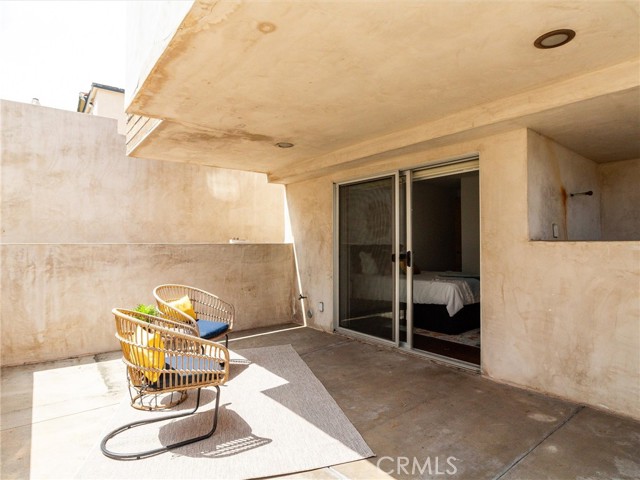 bottom floor enclosed patio off bedroom