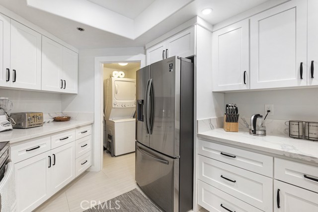 Private laundry room off the kitchen