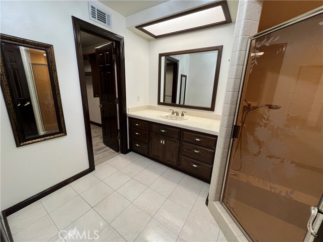 Master bath with walk-in closet