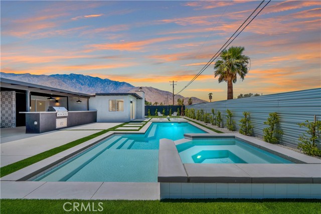 386 W Rosa Parks Road Palm Springs, California Investor's Dream! This neighborhood is the ideal location for investors, as this home can generate well over $100k per year in rental income, with one short-term rental in the community grossing $170k last year. Nowhere else can you get any return like that in Southern California on a property under $1,000,000. There has been significant investment in the neighborhood, including the Miralon community being built across Indian Canyon, meaning quick change is coming to the area. Whether you're looking for an investment property or a primary residence, this is a rare opportunity to own an affordable yet beautifully designed pool home in Palm Springs. 386 Rosa Parks is a fully remodeled mid-century modern designed home with SPECTACULAR VIEWS of San Jacinto Mountain and the PS Tramway! The moment you walk into this home, the modern-designed greets you in the beautiful living room that opens up to a fantastic kitchen with Italian imported cabinets, black stainless steel appliances, floating shelves, and a floor-to-ceiling pantry for plenty of storage. Steps away from the kitchen is a covered outdoor patio including a 16ft bar with a built-in grill & mini fridge, making this the perfect home for entertaining, with all new landscaping/hardscaping surrounding the beautifully designed pool with a raised spa and modern styled tanning shelf. In addition, a separate seating area with a gas line already in place makes it super easy to add a fire pit that also has... you guessed it, INCREDIBLE views of the San Jacinto Mountains. Inside, the Main Bedroom Suite has a retreat-like layout with a dual vanity and walk-in recessed shower. The large walk-in closet adds to all the space you could use in this home and is a rare find for this neighborhood. The main bedroom also has a seating area and direct access to the dream backyard. ********