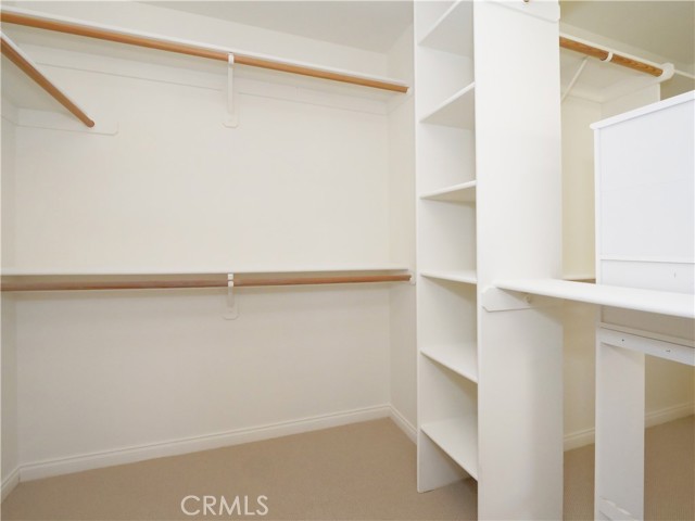 Primary bathroom walk in closets