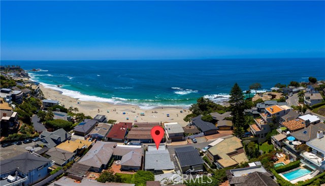 2838 Wards Terrace Laguna Beach, California Three apartments located on the second row from Laguna's famous Victoria Beach! One unit in the rear is very private, and there are two additional units in front, one upstairs and one at street level. There are ocean views from the upstairs unit. This is an excellent opportunity to redevelop the property into a single family home, on a street with several ocean-front homes, or for continued use as income property. The two larger units in front may be combined into a single 2-level beach house, and the rear apartment may be used as a detached studio, office or gym. The three units currently generate $8,685 in monthly rents.