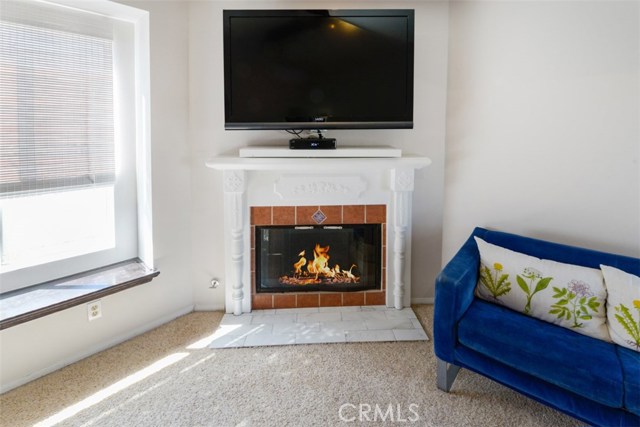 A view of the window seat fireplace.