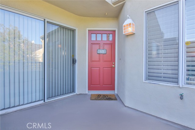 Front Entry with private patio/landing/sitting area.