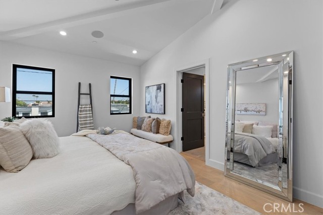Primary suite has vaulted ceilings, large closet, and receives great morning light