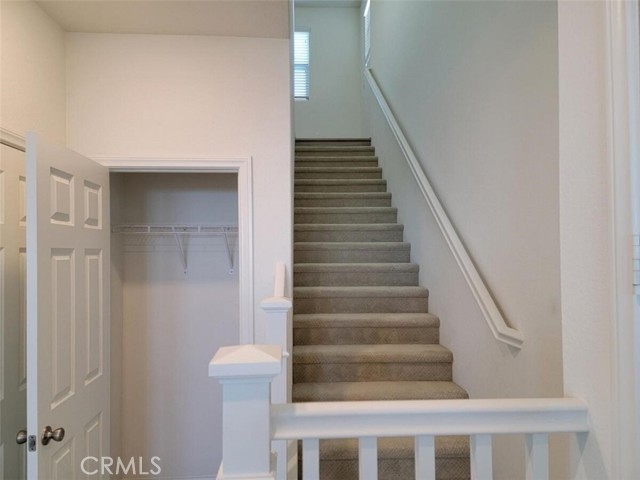 COAT CLOSET AND STAIRS