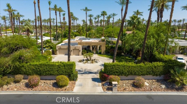 Welcome to one of the largest properties in the area! This completely walled and gated contemporary estate is located in the elite Tamarisk area of Rancho Mirage. The lush landscaped 33,000+ sqft lot gives you the feel of a tropical paradise, with privacy and security. As you enter the driveway gate you will feel right at home. The circular driveway leads you to the front door and oversized 3 car garage. This property has over 4600 sqft., large living area with tall ceilings and lots of glass, newly remodeled kitchen with high-end appliances, 5 bedrooms and 6 bathrooms. The master suite has a grand fireplace, opens to backyard, two large closets, extra-large bath, and private outdoor spa. The backyard includes a two-room guesthouse (560 sqft), outdoor fireplace and BBQ, huge new pool and two inground hot tubs/spa, and plenty of patio and lawn for entertaining. There are several new major remodeled upgrades to this property including solar panels (owned), new pool, spas, fantastic kitchen, multiple HVAC units, and water heaters to name a few. This estate has it all, completely gated, close to all the country clubs, restaurants and NO HOA fee! (HVAC - 3 Trane in main house and casita, 1 Samsung unit in garage, 2 new Bradford water heaters)