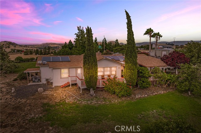 Night photo of back side of home.