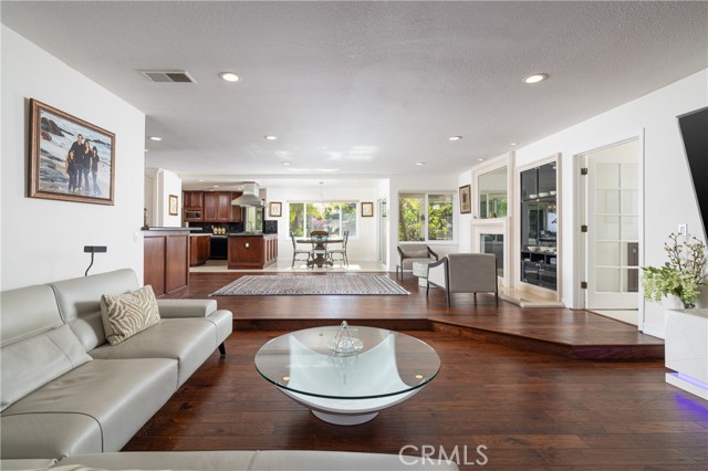 Step down living room with beautiful flooring