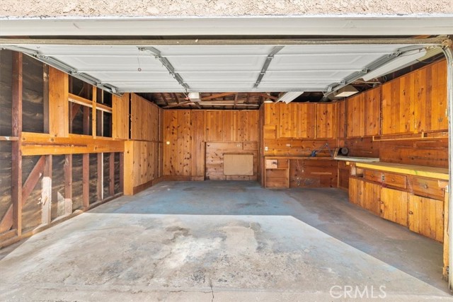 Garage with plenty of built-ins for storage