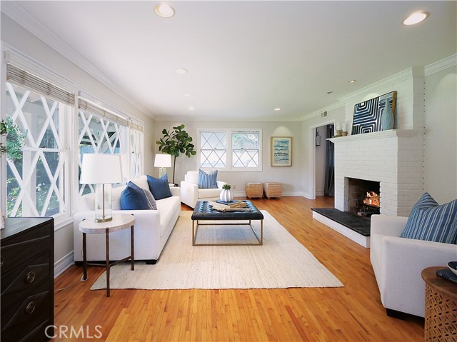 Large and bright living room with fireplace
