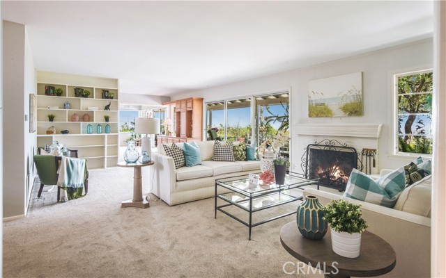 Living Room w/Fireplace and views