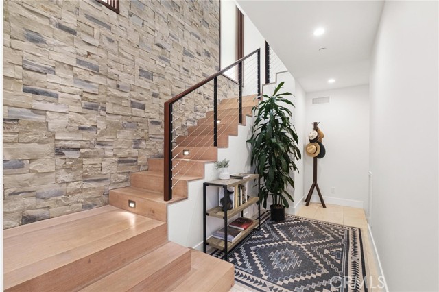 Lower level stairs up to entry bedroom level