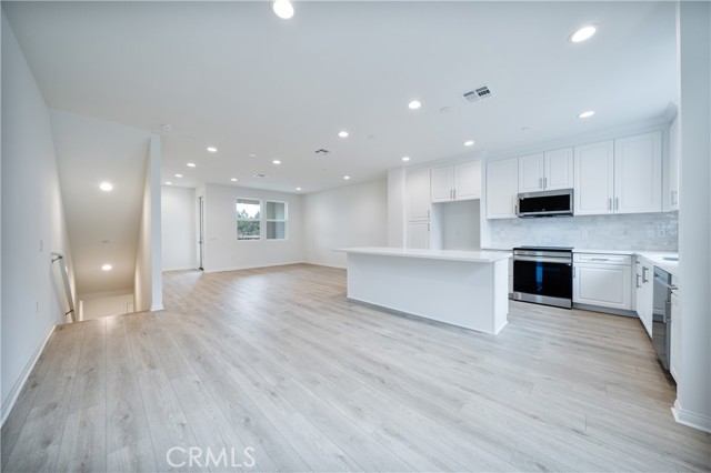 Detail Gallery Image 3 of 38 For 2440 E Lincoln Ave #3,  Anaheim,  CA 92806 - 4 Beds | 3/1 Baths